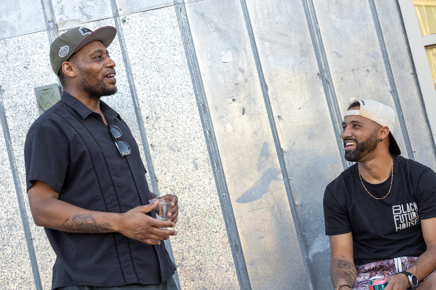 Andrae Washington (left) talking with RichesArt at a startup event sponsored by Midwest Forward Ventures at the RichesArt Gallery